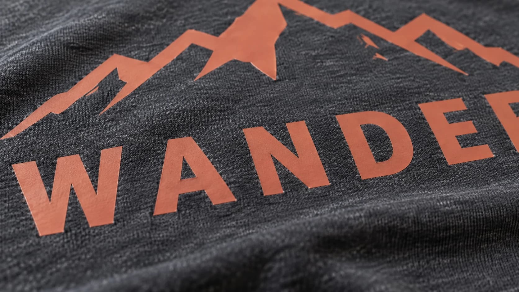 Terracotta heat-transfer vinyl bonded to charcoal cotton knit